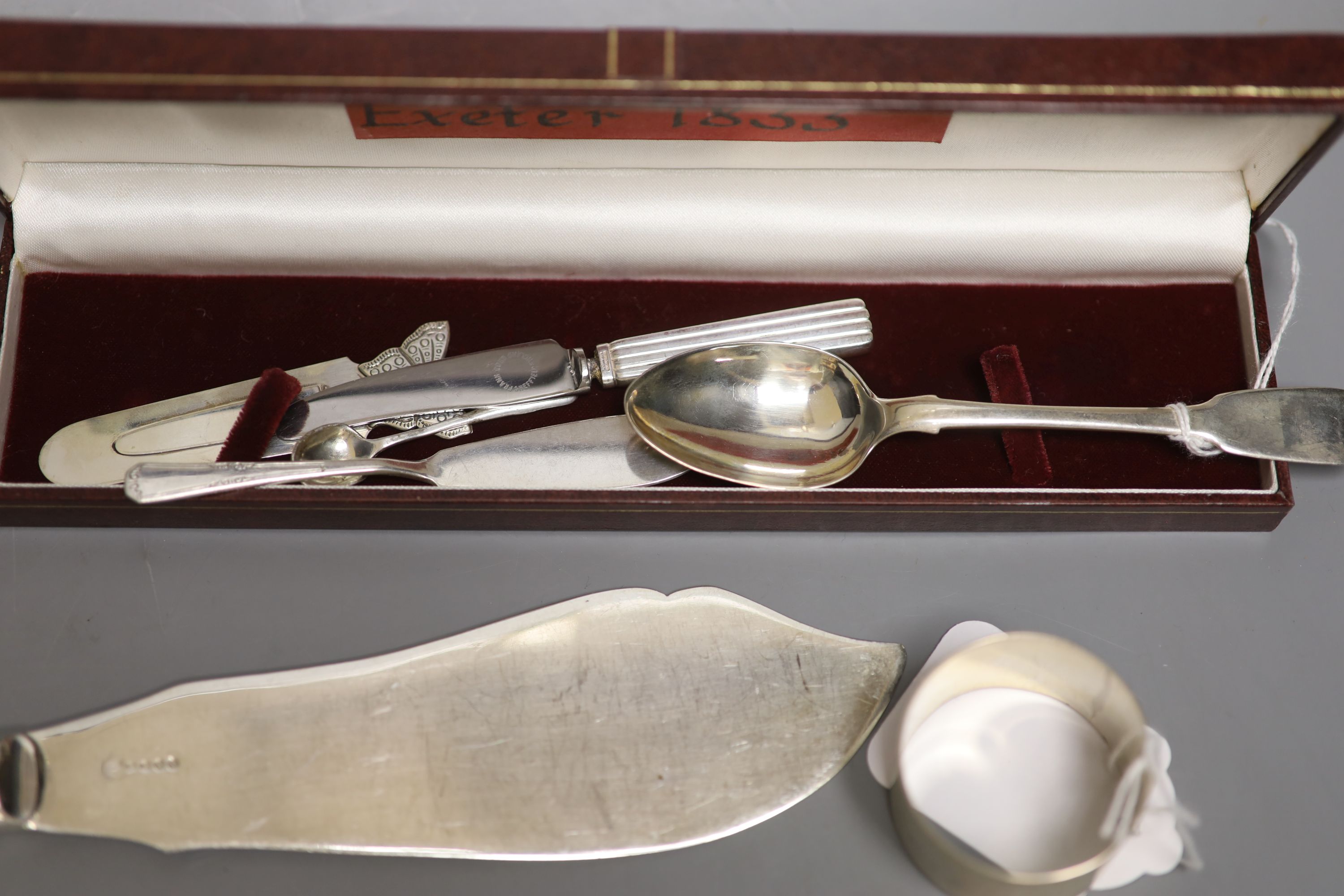 A small collection of silver and plated flatware,